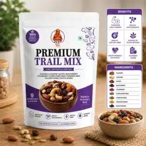 JustShudh Premium Trail Mix pack with ingredients list — almond, cashew, dates, cranberry, sunflower seed, pumpkin seed, raisins